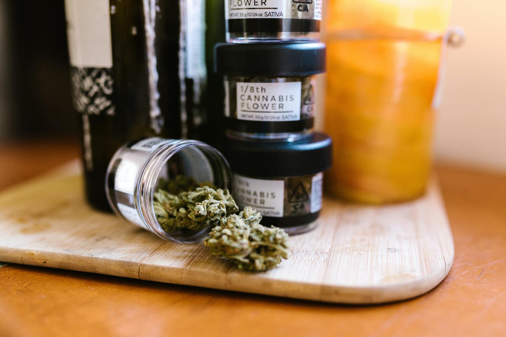 Jars of Cannabis flower on tray